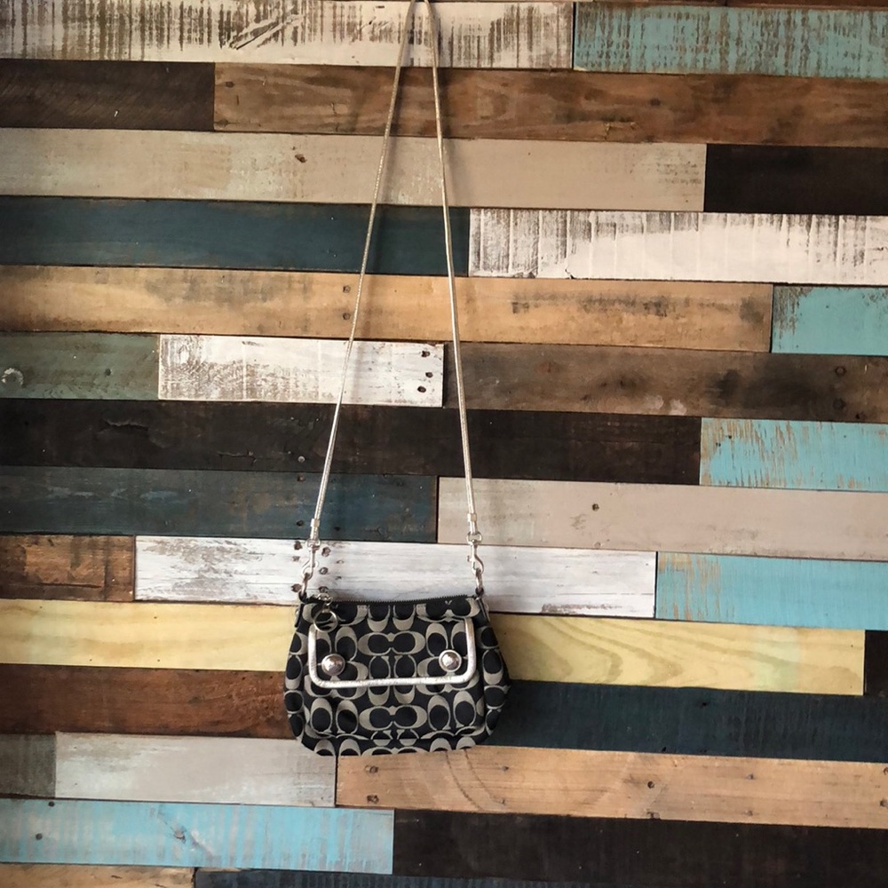 Silver and black Coach crossbody